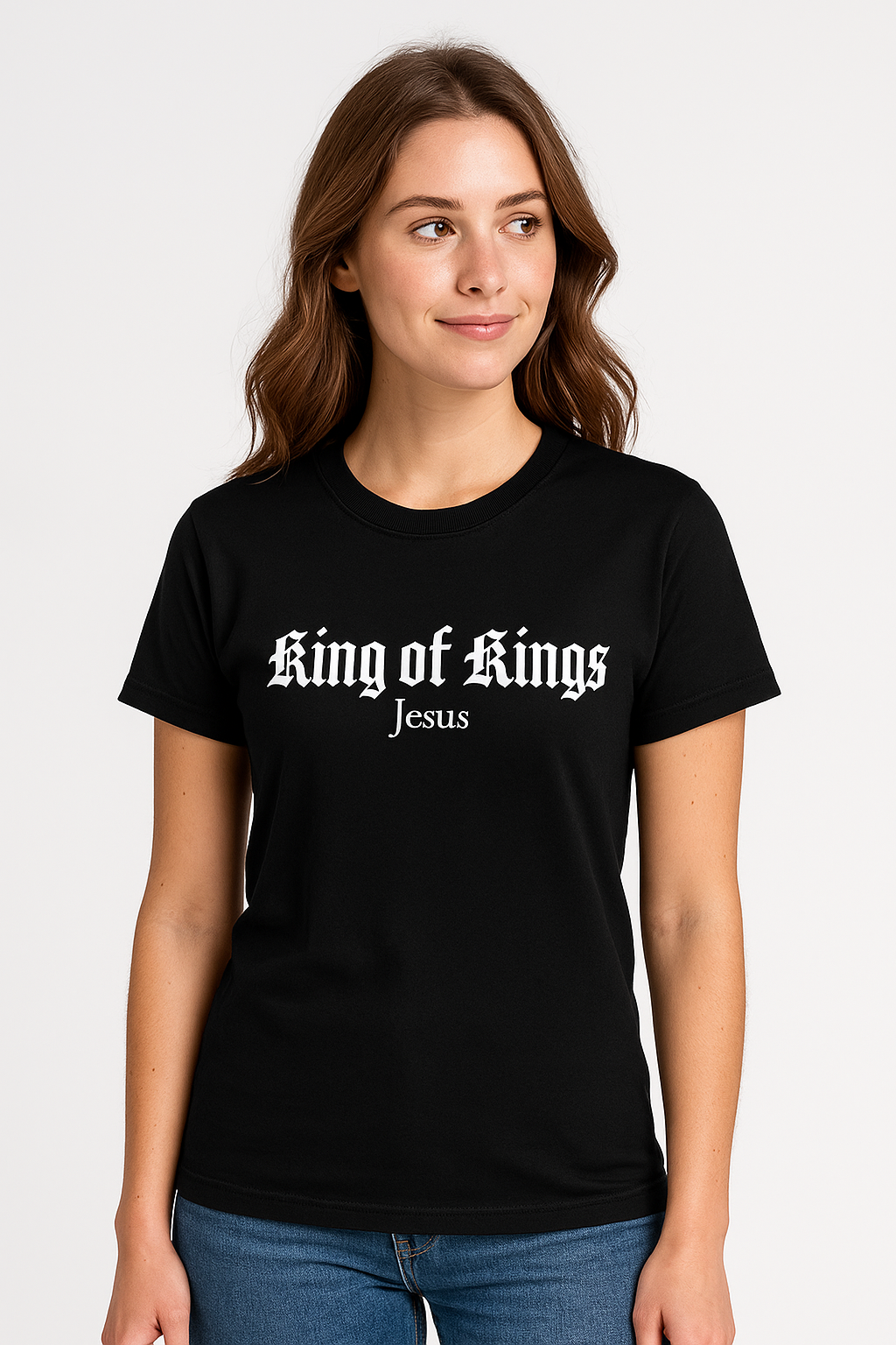 Woman wearing a black t-shirt with 'King of Kings Jesus' text on a white background